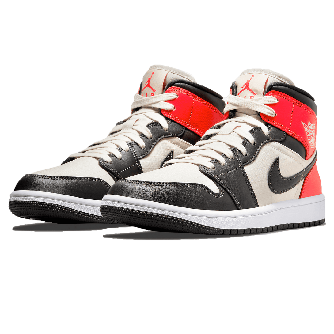 Air Jordan 1 Mid SE Wmns 'Newsprint'- Streetwear Fashion - evapacs.com